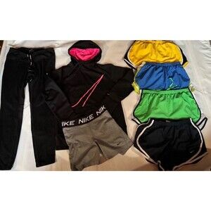 Nike Women’s Medium Dry -Fit Active Bundle 7  Piece Shorts Leggings Reflective